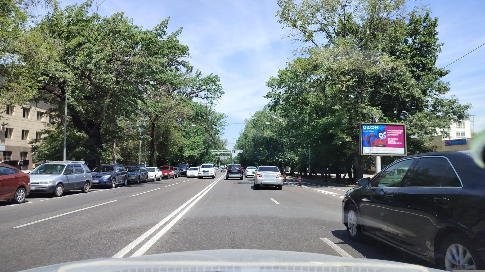 Street view near THE FIRST Apart Hotel, Almaty — © sevenmp (CC BY-SA · Mapillary)