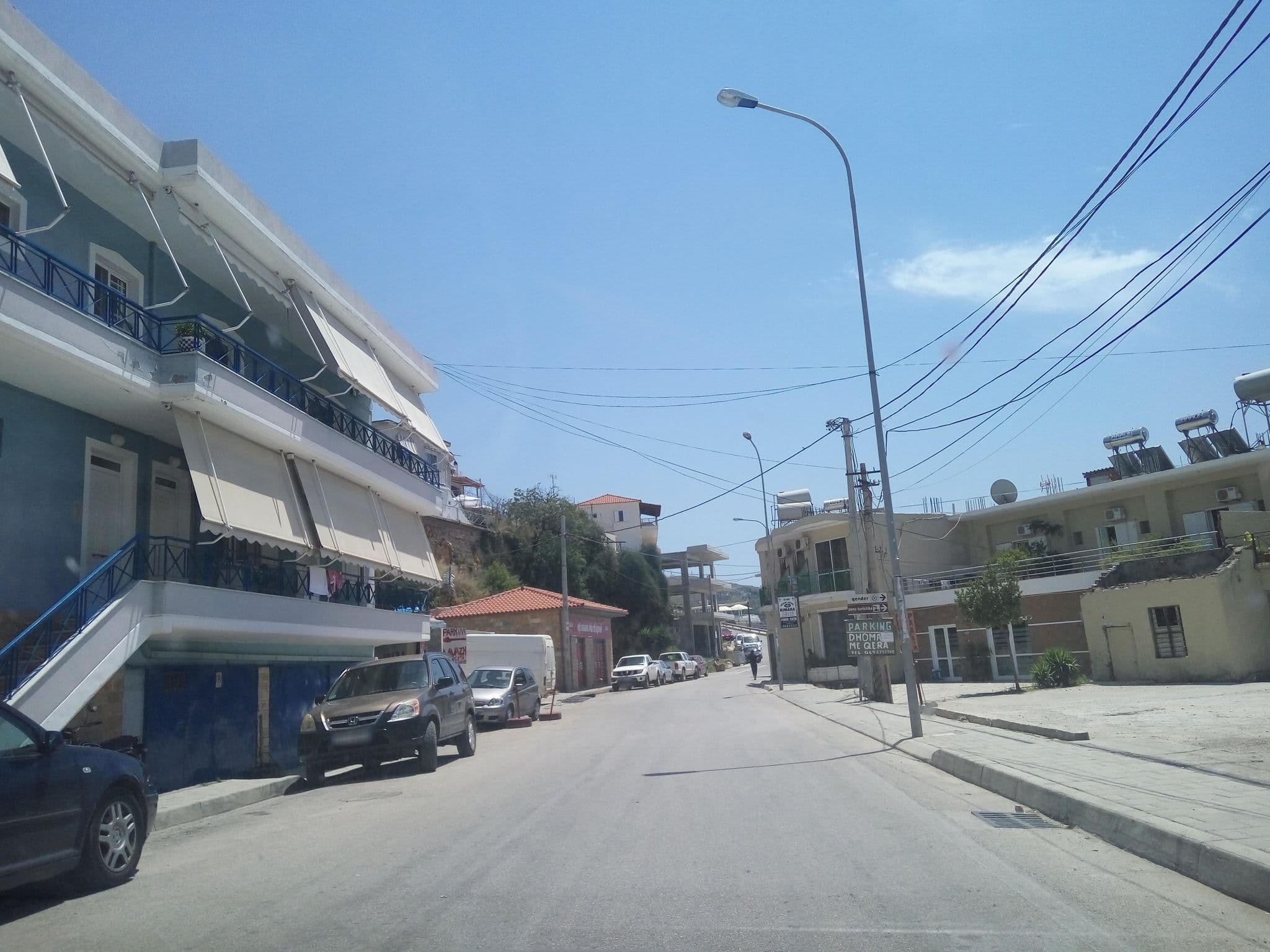 Street view near Saint Nicolas Hotel, Himarë — © ardob11 (CC BY-SA · Mapillary)