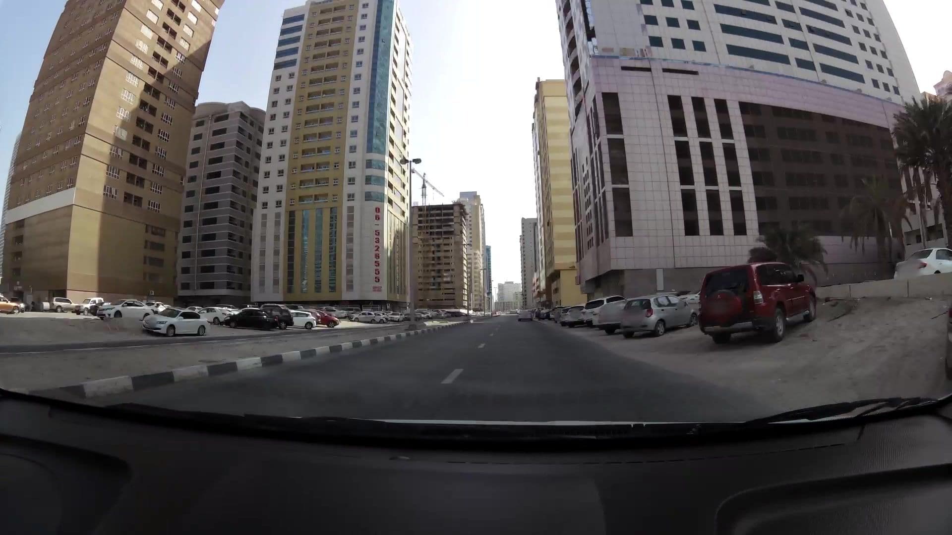 Street view near Al Gaddah Hotel Suites, Al Majaz — © kaartcam (CC BY-SA · Mapillary)