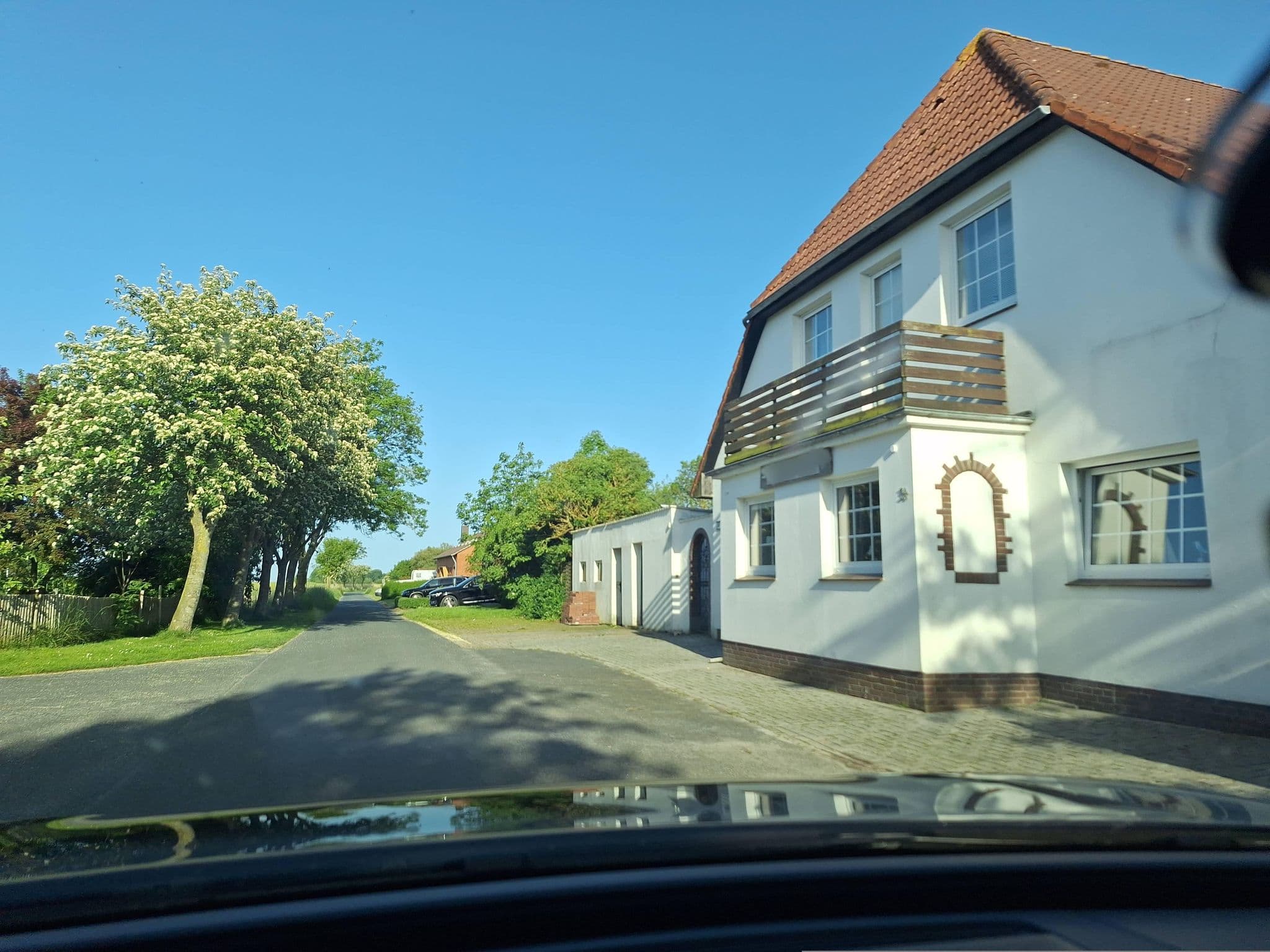 Street view near Ferienwohnung Küstersmatt 1, Schillig — © Viator_Invisibilis (CC BY-SA · Mapillary)