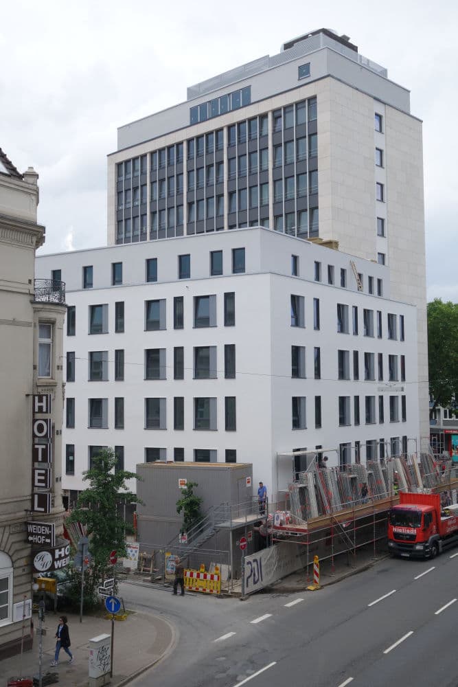 Me and All Hotel Dusseldorf (via Wikimedia Commons, Public domain)