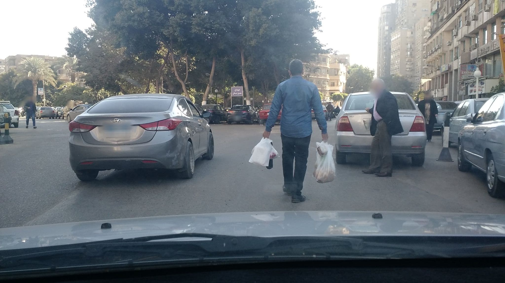 Street view near Maadi Hotel, Abū an Numrus — © roadroid (CC BY-SA · Mapillary)