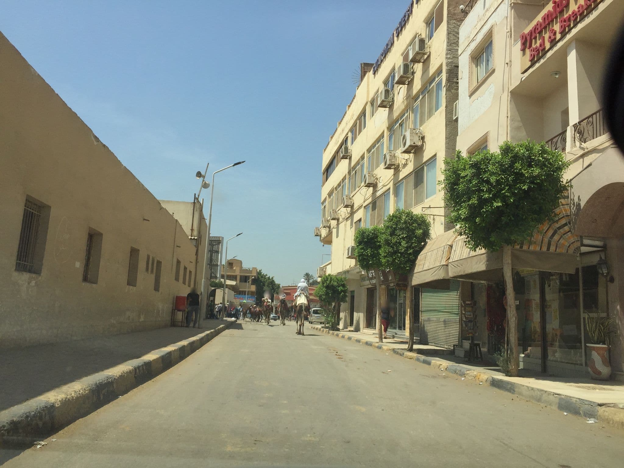 Street view near Great Pyramids Inn, Abū an Numrus — © aymanali (CC BY-SA · Mapillary)