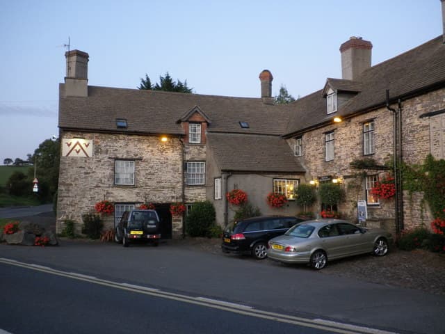The Three Cocks Coaching Inn (via Wikimedia Commons, CC BY-SA 2.0)