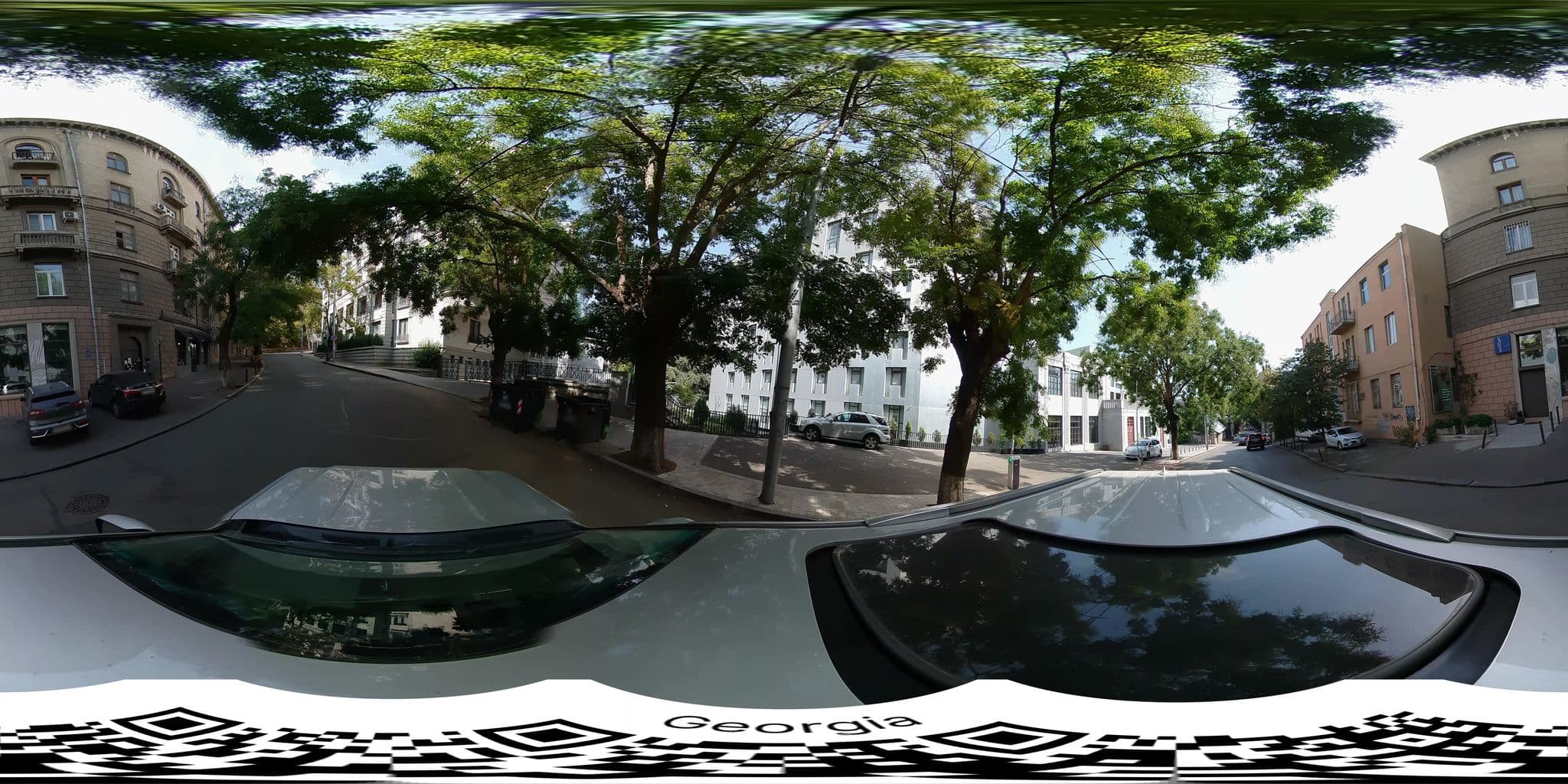 Street view near Pine Astoria Hotel, Okroq’ana