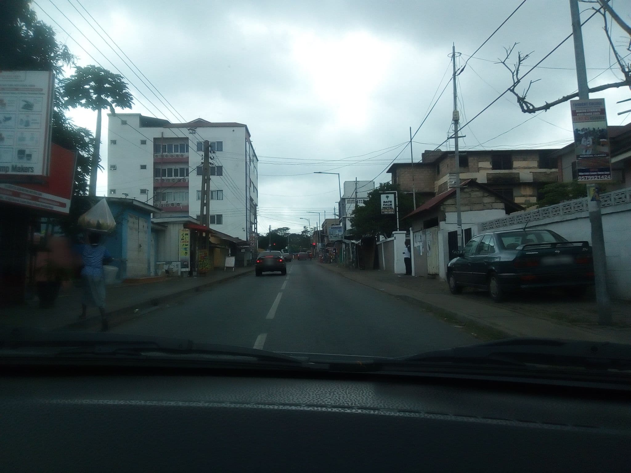 Street view near The Date Hotel, Accra — © amuzujoe (CC BY-SA · Mapillary)