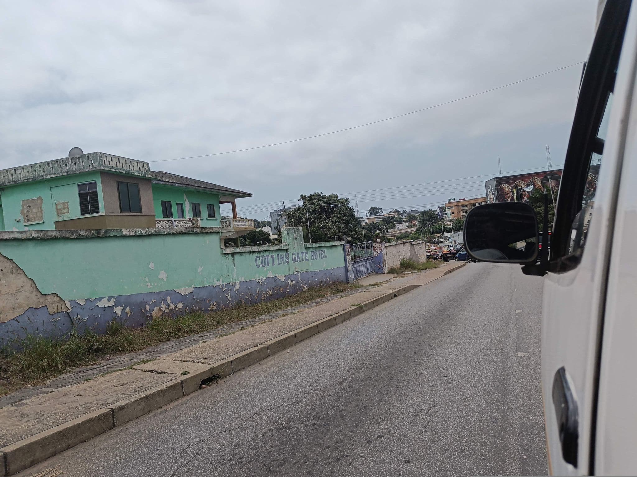 Street view near Collins Gate Hotel, Accra — © RabiatuHijabGirl1 (CC BY-SA · Mapillary)