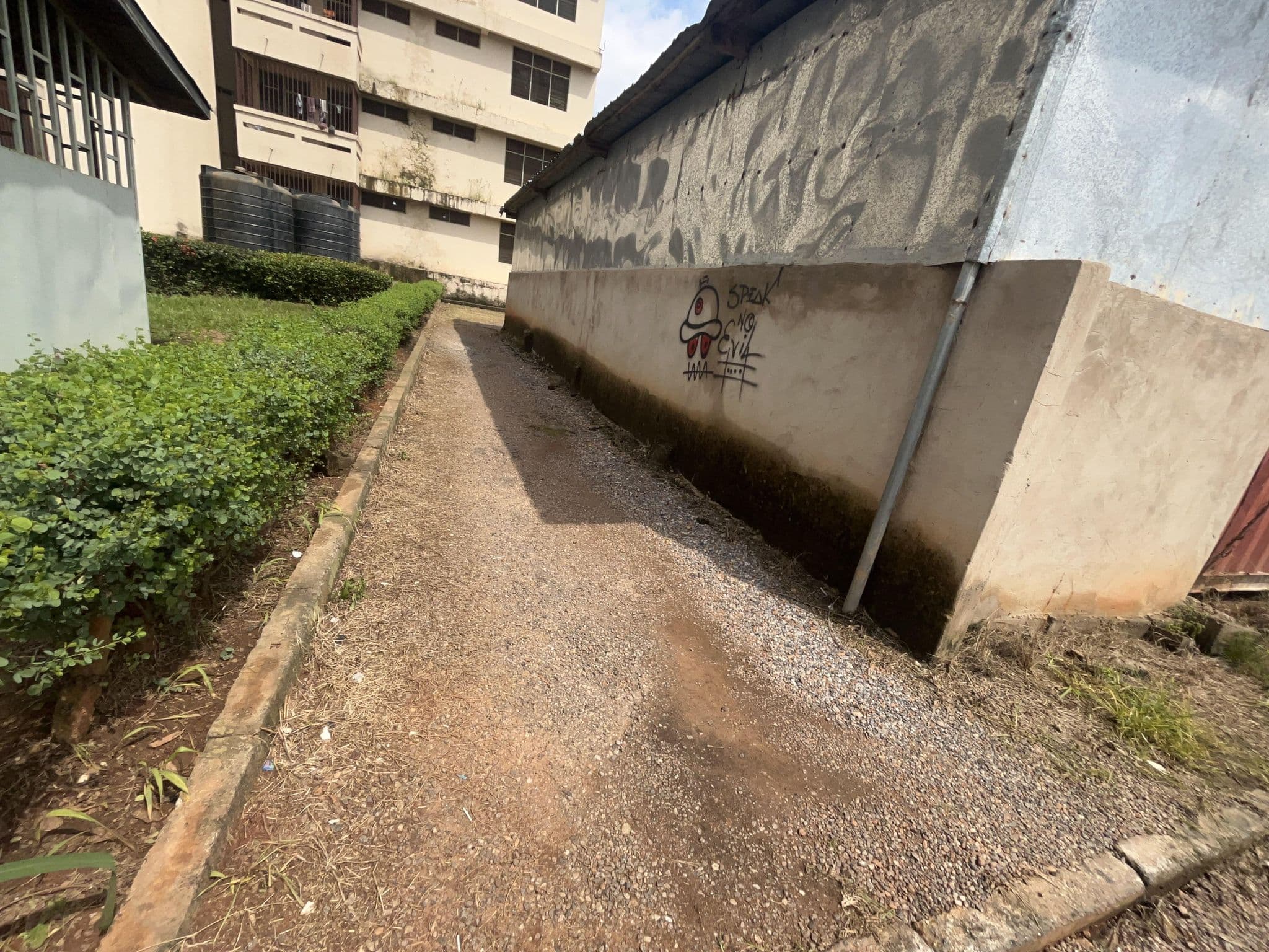Street view near Tek Credit Union Hostel, Kumasi — © Agadzi (CC BY-SA · Mapillary)