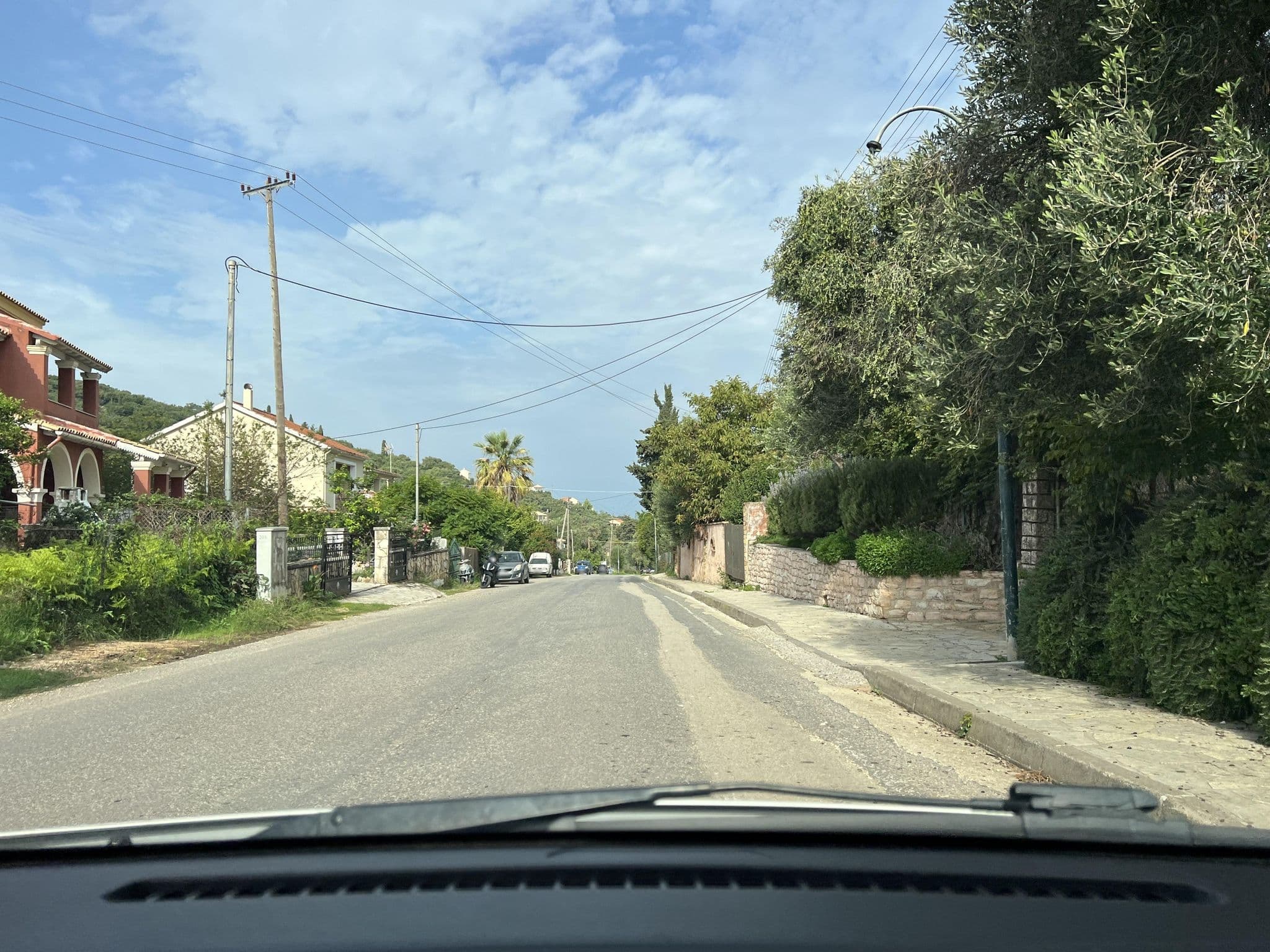 Street view near Emily's Apartments, Acharávi — © VMConsulting (CC BY-SA · Mapillary)