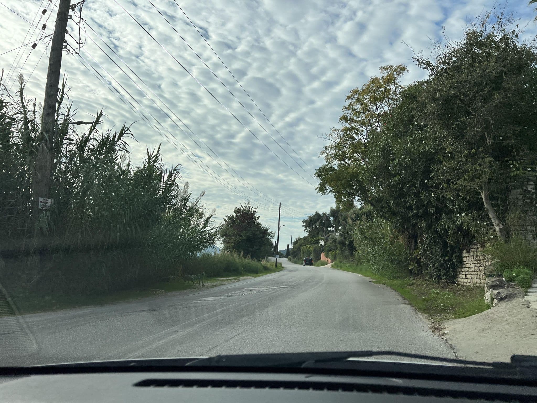 Street view near Oniro Villas, Ágios Matthaíos — © VMConsulting (CC BY-SA · Mapillary)