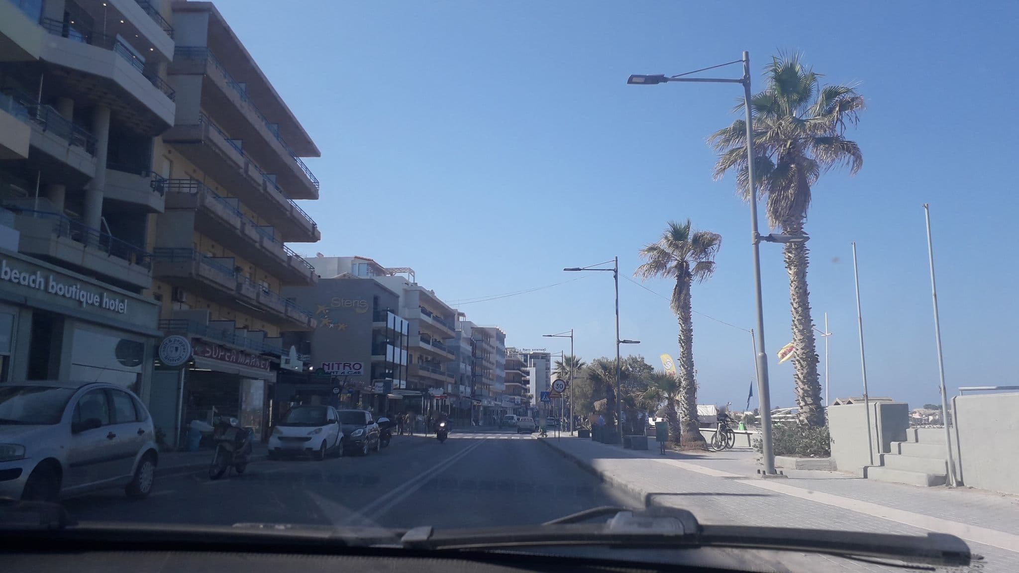 Street view near Palm Beach Apartments, Rethymno