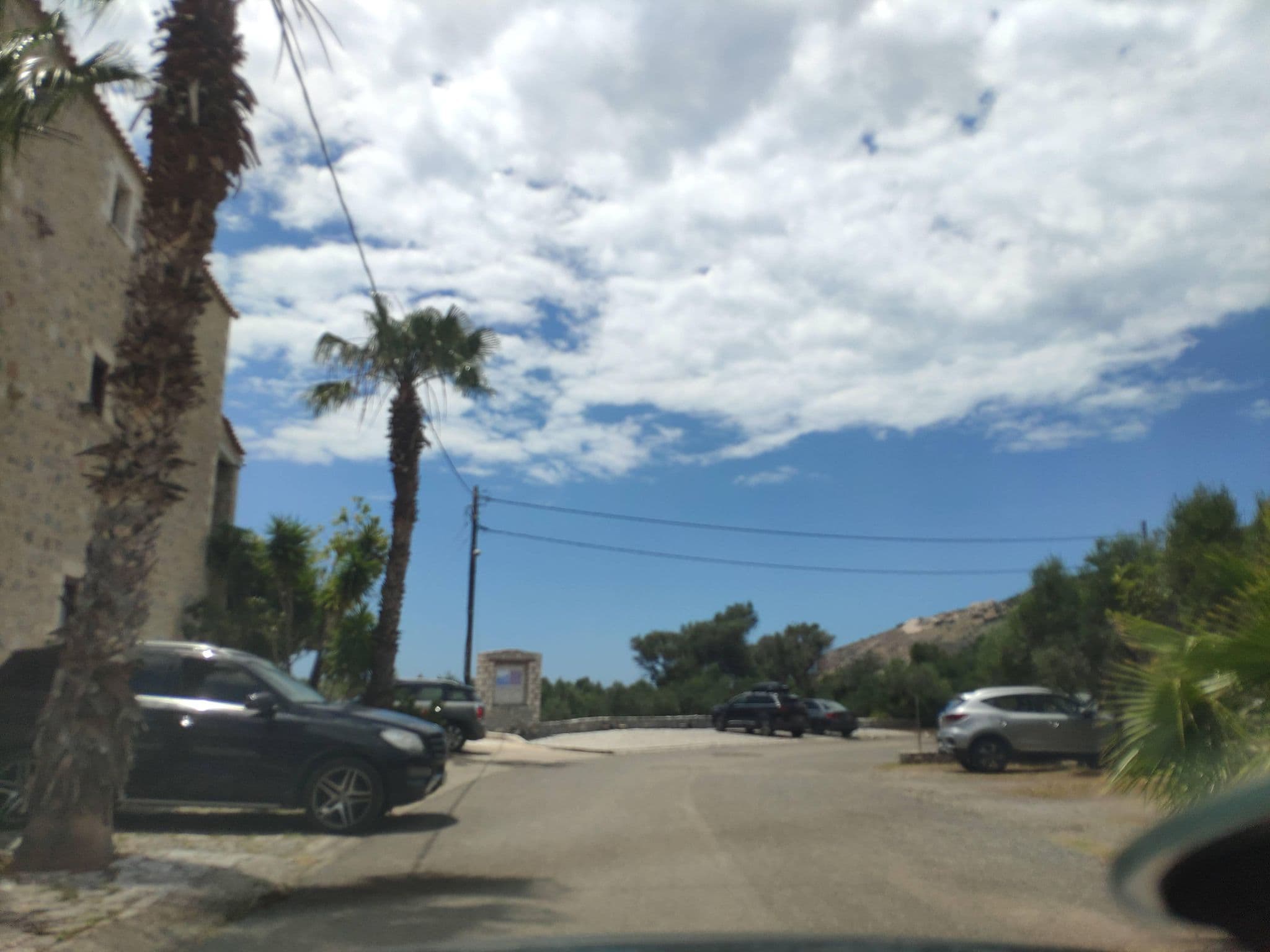 Street view near Porto Vitilo Boutique Hotel, Oítilon — © pppetros (CC BY-SA · Mapillary)