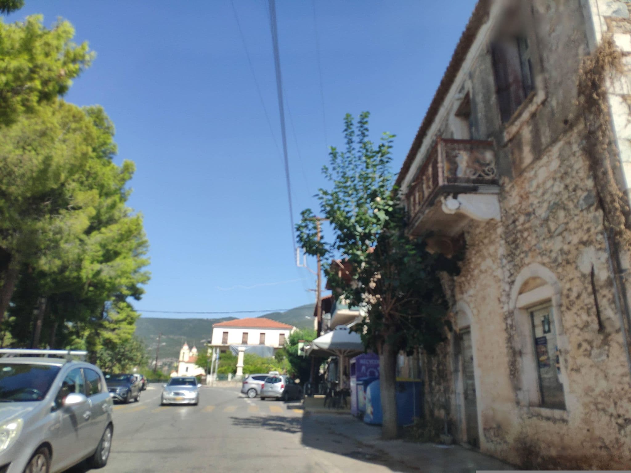 Street view near Skarmadoula's Garden Apartments, Avía — © pppetros (CC BY-SA · Mapillary)