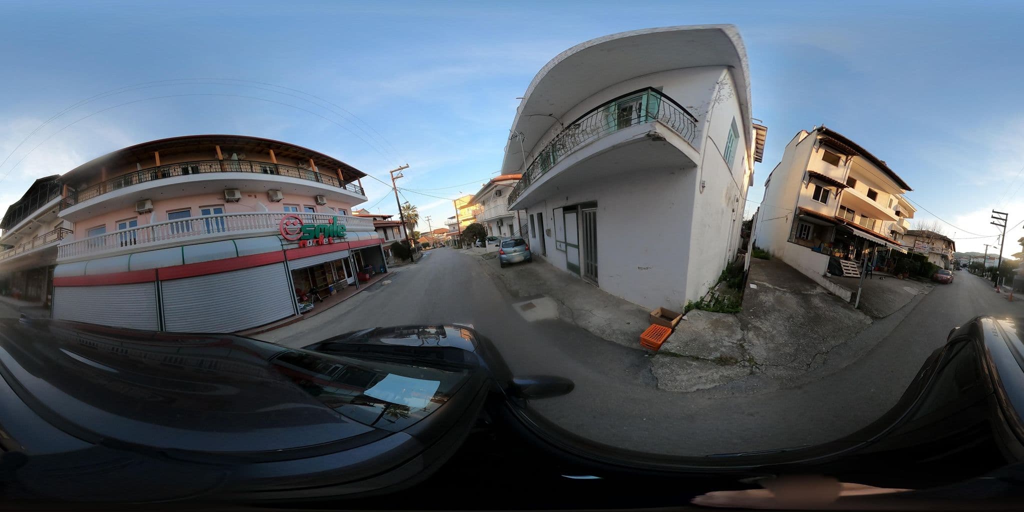 Street view near Smile apartments, Aigáni — © efikour (CC BY-SA · Mapillary)