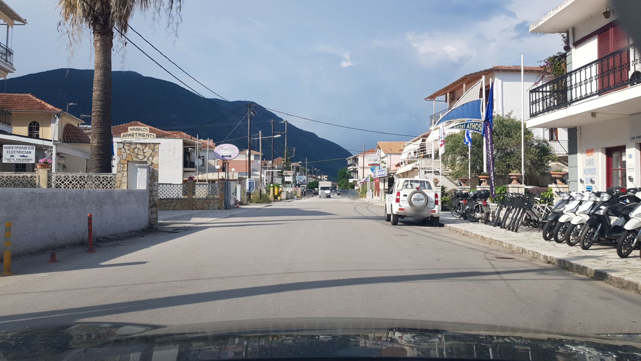 Street view near Aggelos Appartments, Nidhríon — © roadroid (CC BY-SA · Mapillary)