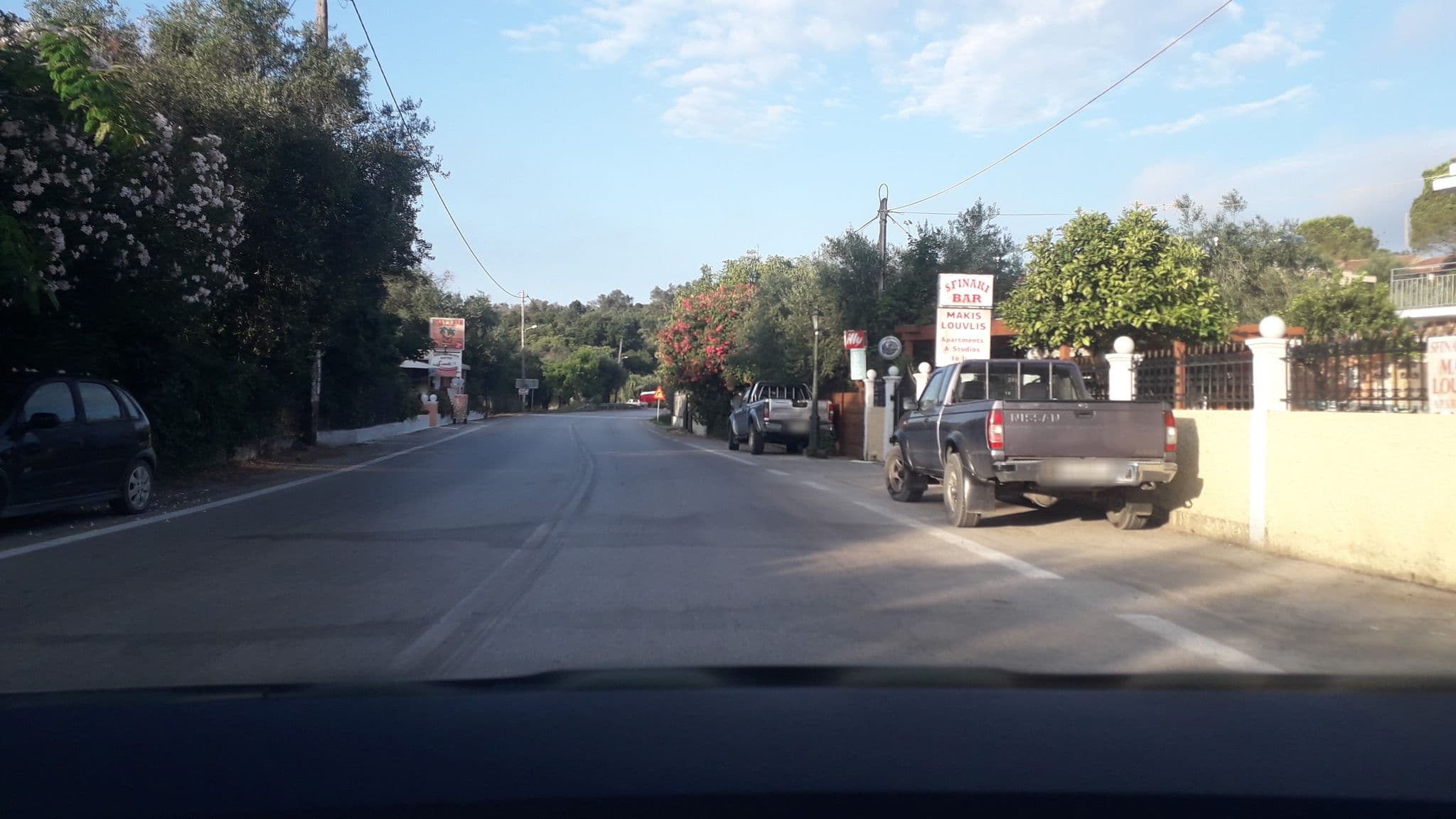 Street view near Makis Apartments, Ágios Matthaíos — © dli (CC BY-SA · Mapillary)