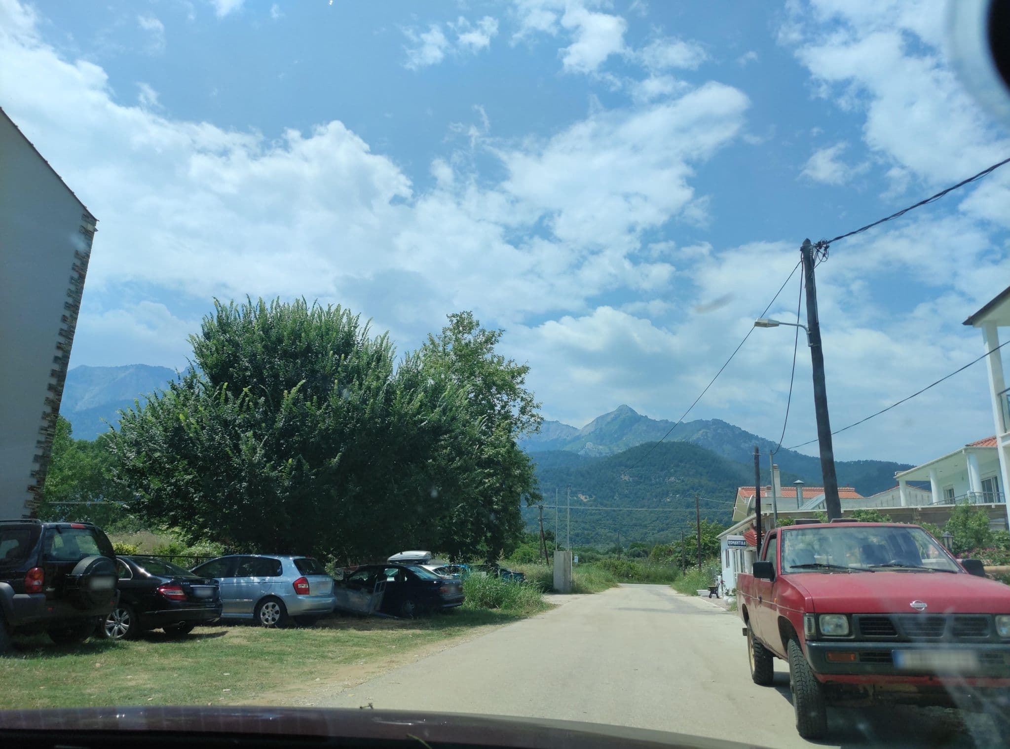Street view near Studios Afrodite, Potamiá — © neau (CC BY-SA · Mapillary)