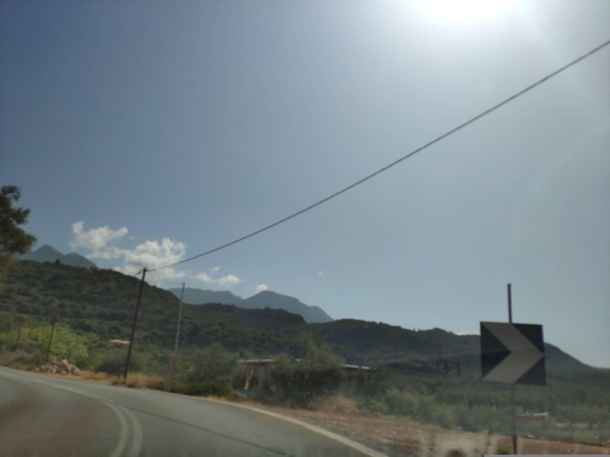 Street view near Ourania's Studios, Avía — © pppetros (CC BY-SA · Mapillary)