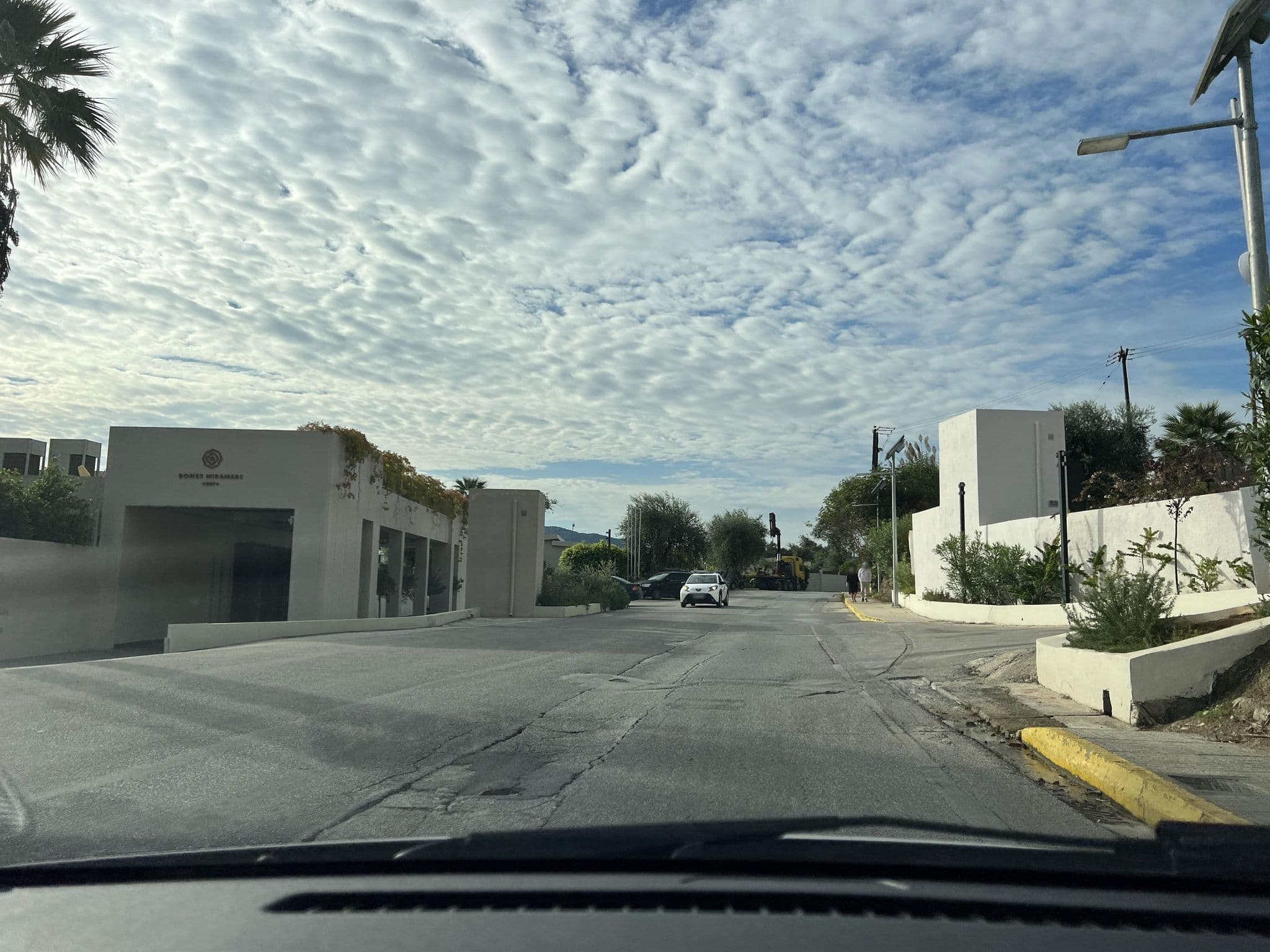 Street view near Domes Miramare, Ágios Matthaíos — © VMConsulting (CC BY-SA · Mapillary)