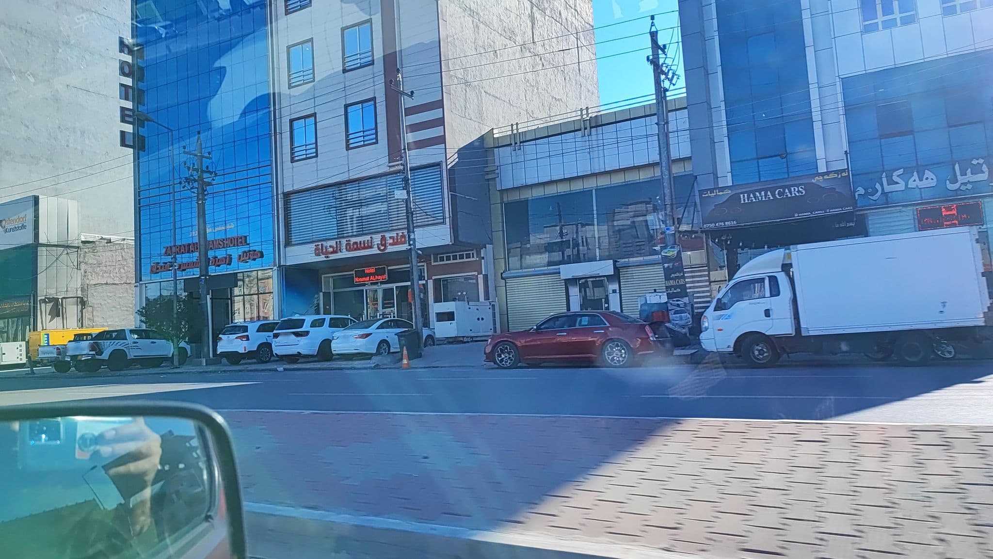 Street view near Nasma Al-Hayat Hotel, Erbil — © muhammadismael (CC BY-SA · Mapillary)