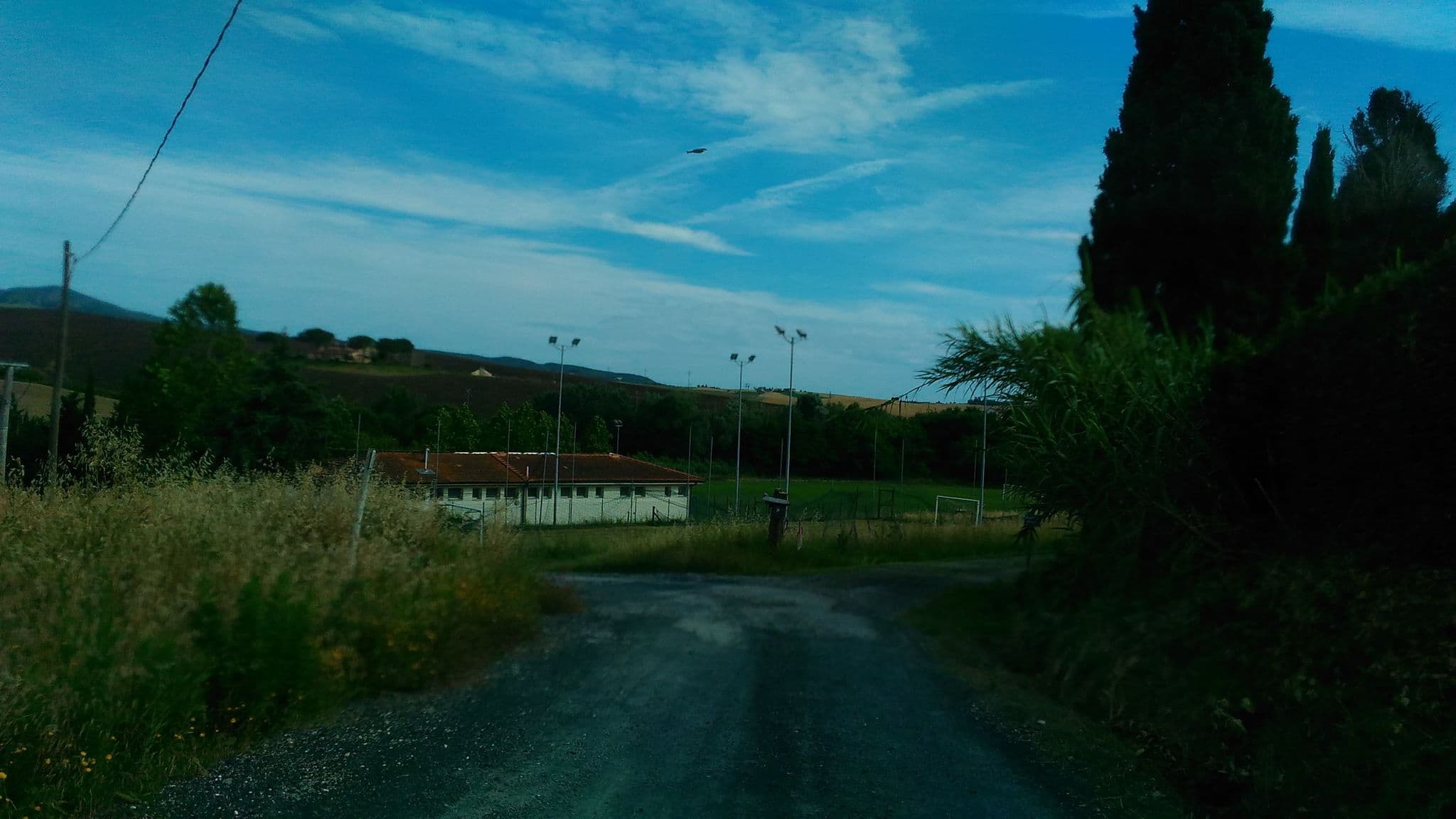 Street view near Le Colombaie, Rosignano Marittimo — © momix (CC BY-SA · Mapillary)