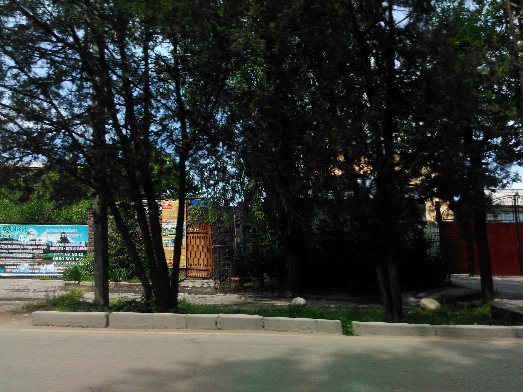 Street view near Guesthouse Traveler, Bishkek — © serj_nickel (CC BY-SA · Mapillary)
