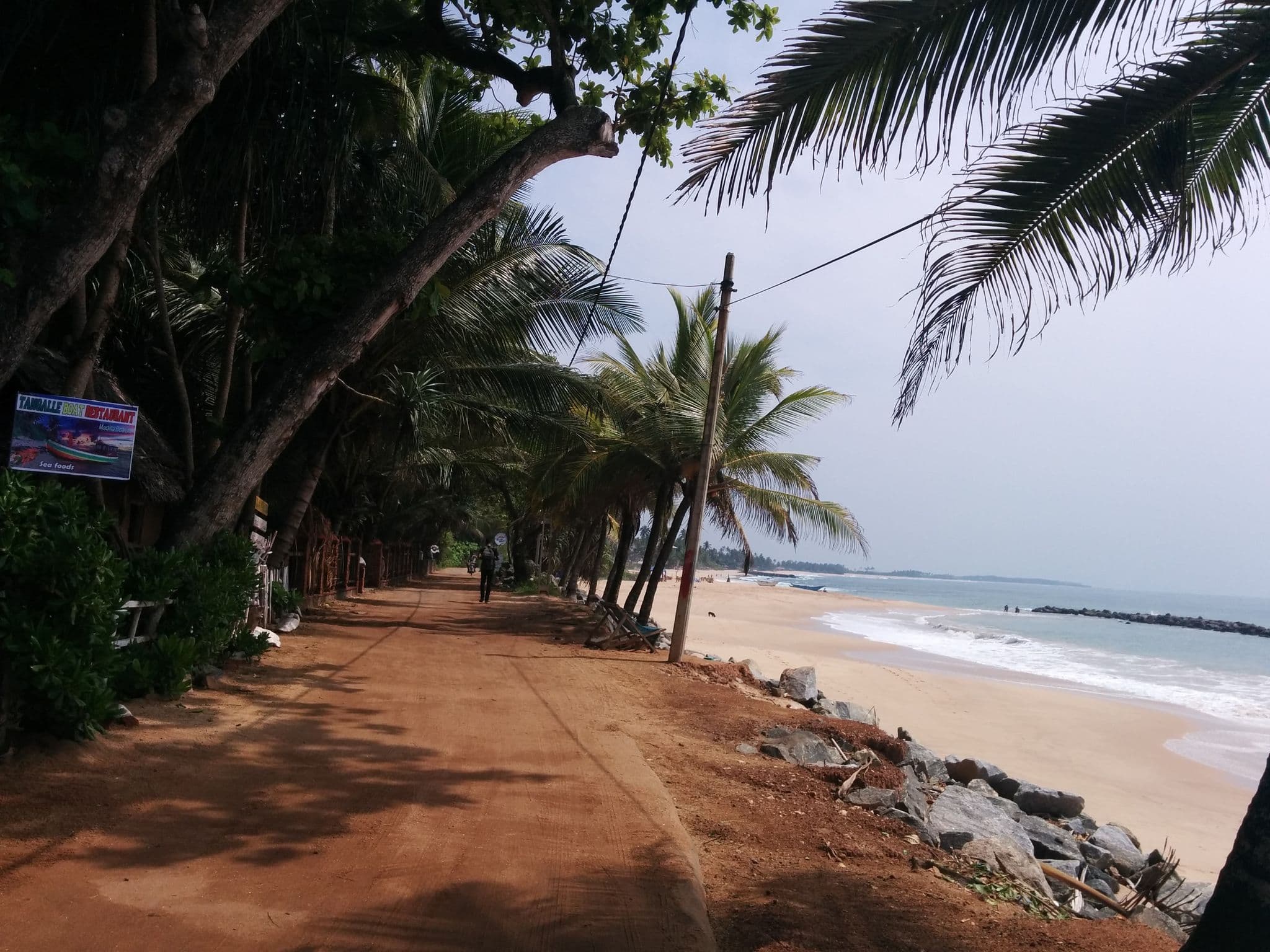 Street view near Chandi Gaya Guesthouse, Tangalle — © chivos (CC BY-SA · Mapillary)