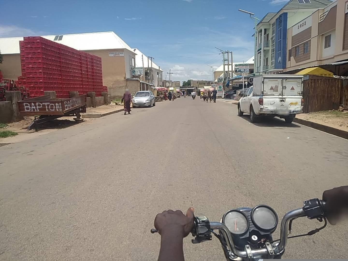 Street view near san Hussain supermarket, Gombe — © Lukmanibukar (CC BY-SA · Mapillary)
