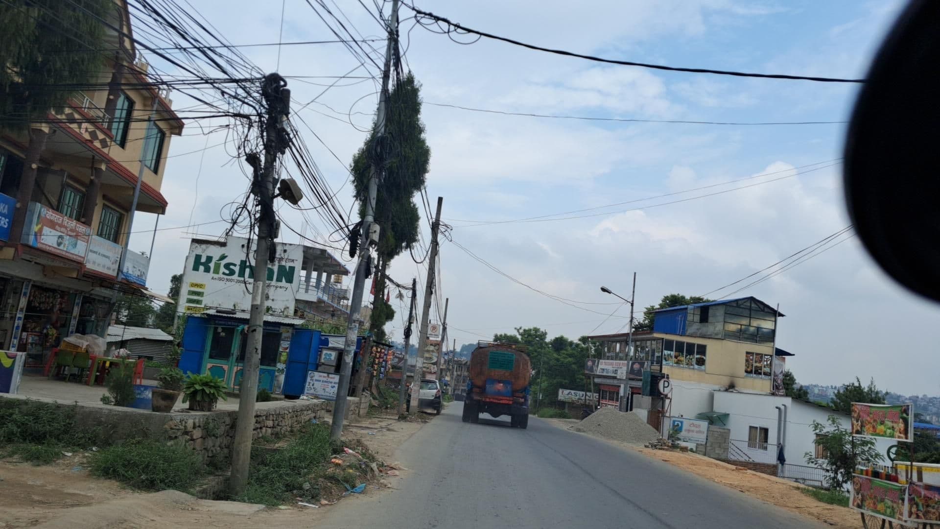 Street view near Taudha view garden resort pvt ltd, Ki̇̄rtipur — © roadroid (CC BY-SA · Mapillary)