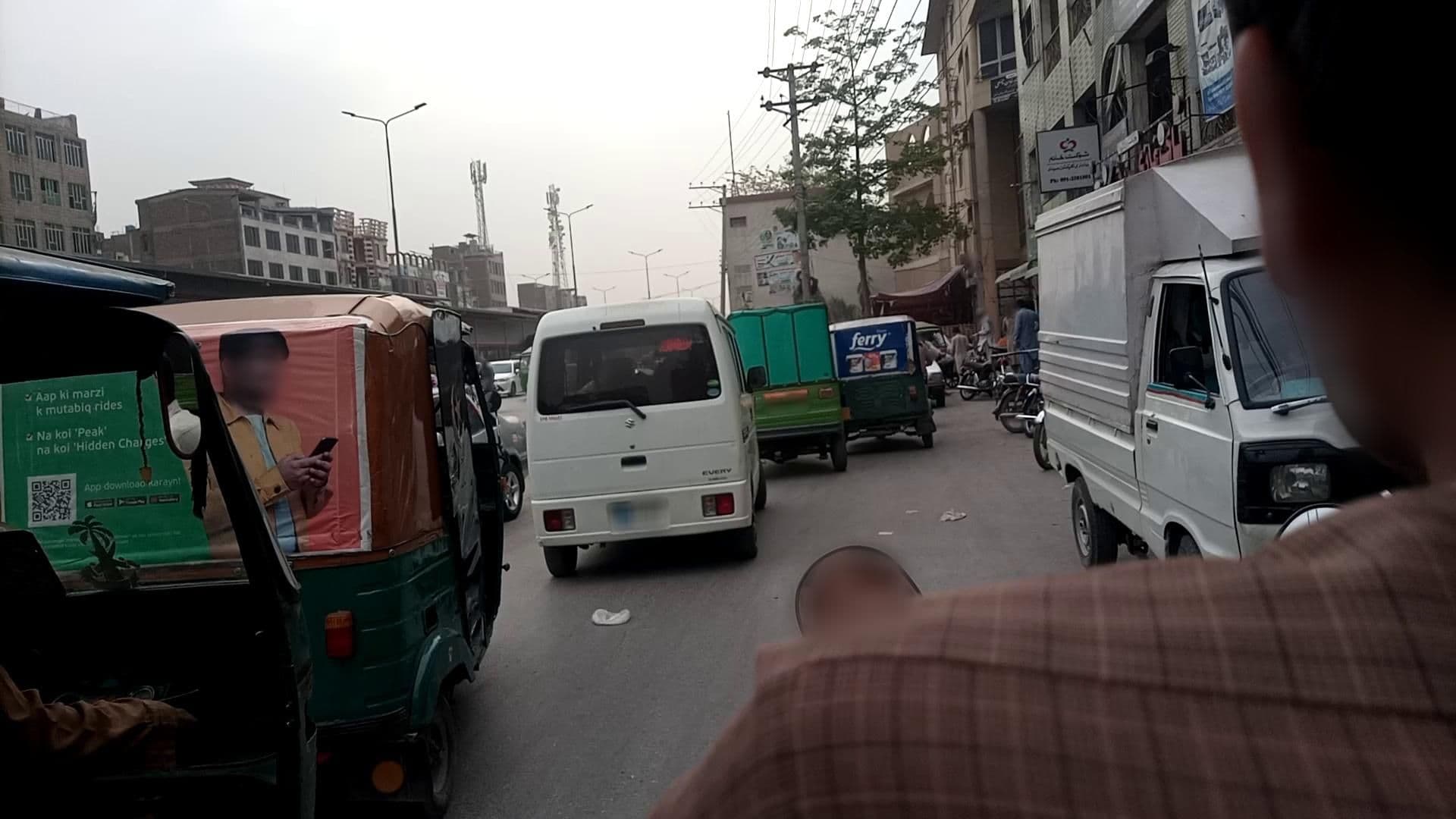 Street view near Amin Hotel Peshawar, Peshawar — © RobinGoix (CC BY-SA · Mapillary)