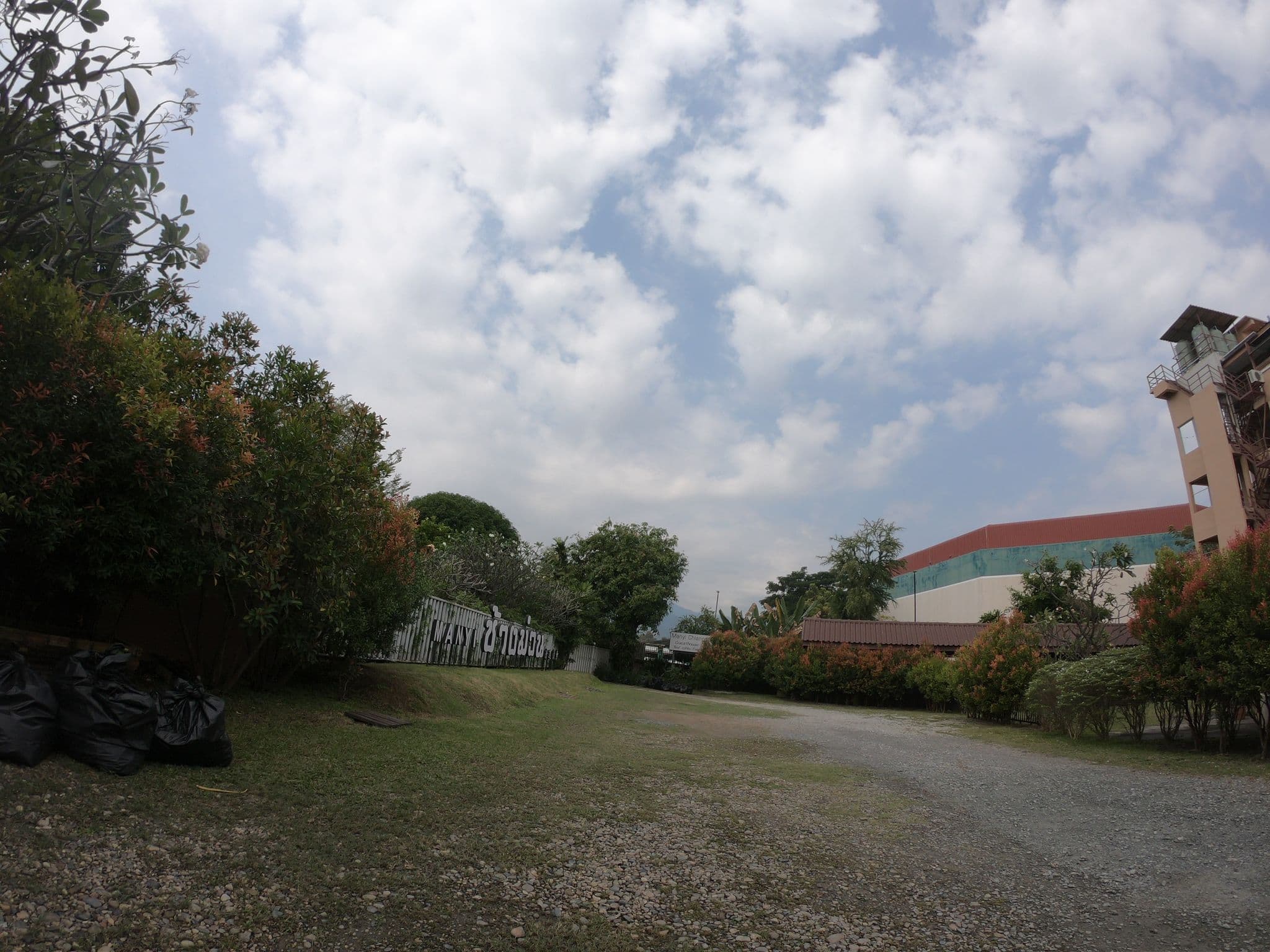 Street view near The Casa Guesthouse, Chiang Mai — © chanuwath_grab (CC BY-SA · Mapillary)