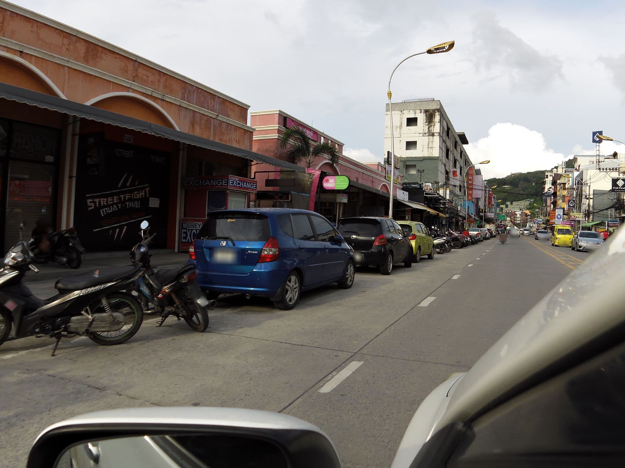 Street view near The Yim Siam Hotel, Patong — © skillsy (CC BY-SA · Mapillary)