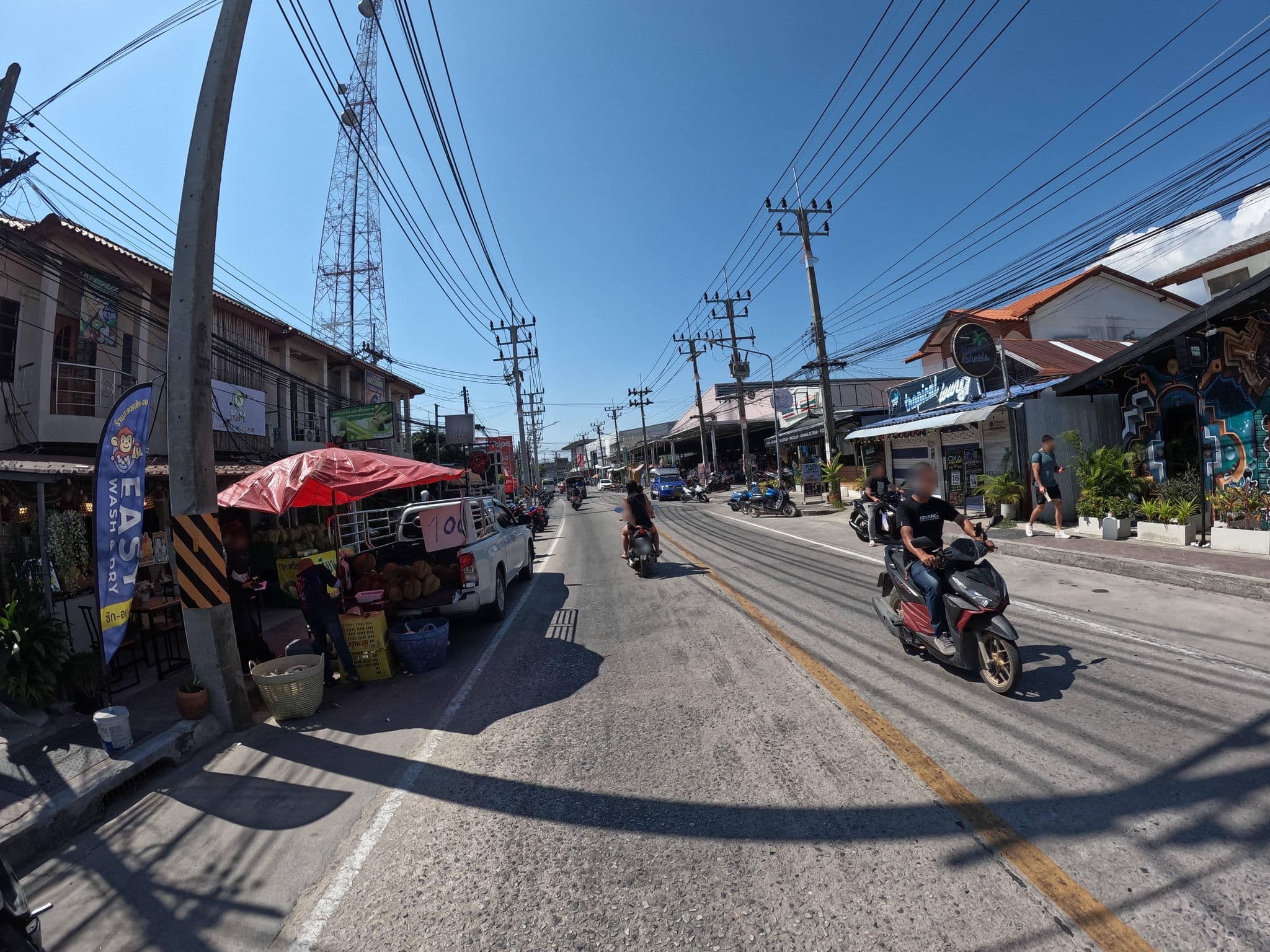 Street view near Sandee Backpackers, Ko Pha Ngan — © lucomsky (CC BY-SA · Mapillary)