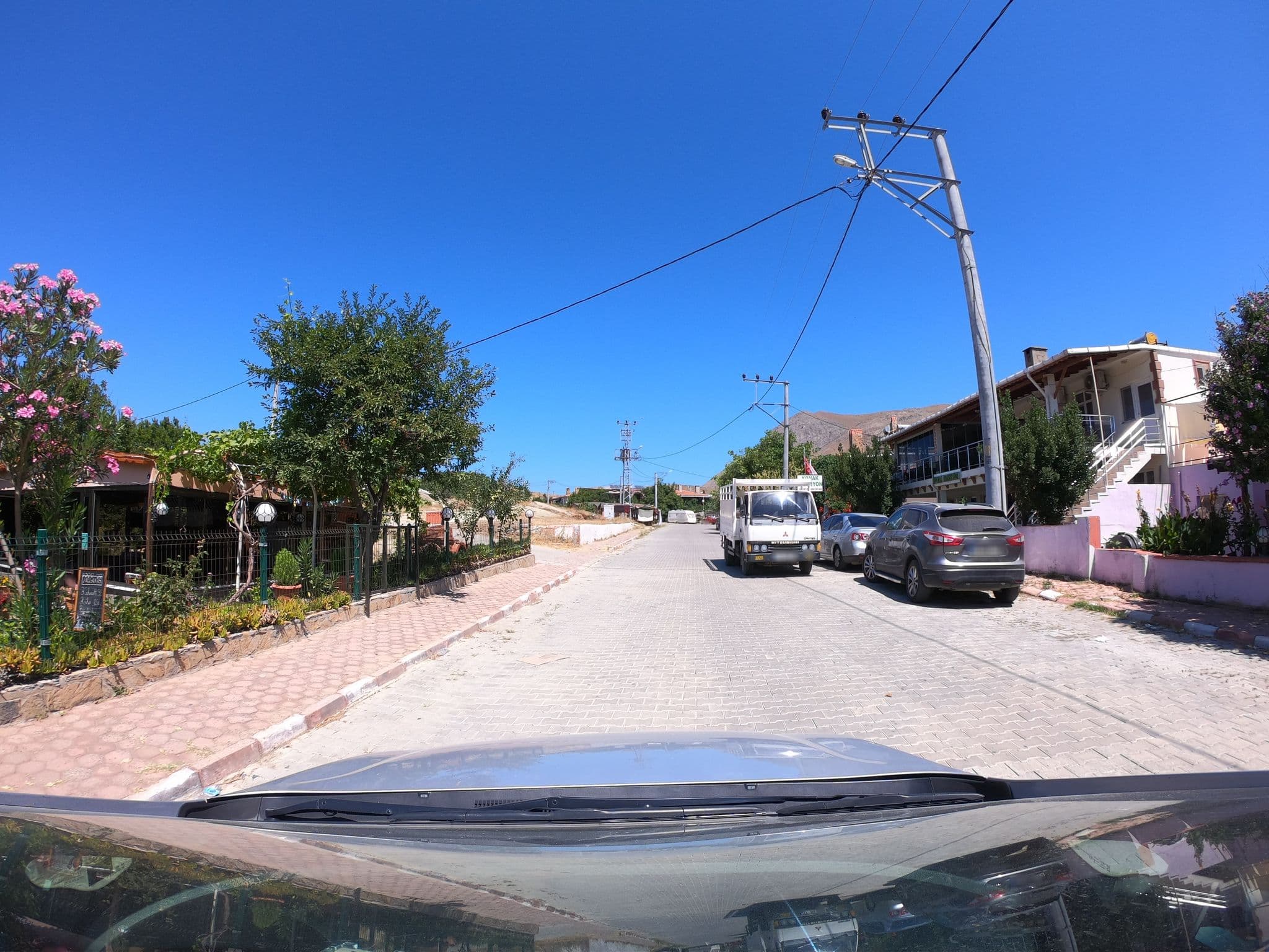 Street view near Olimbera Otel, Gökçeada — © asturksever (CC BY-SA · Mapillary)