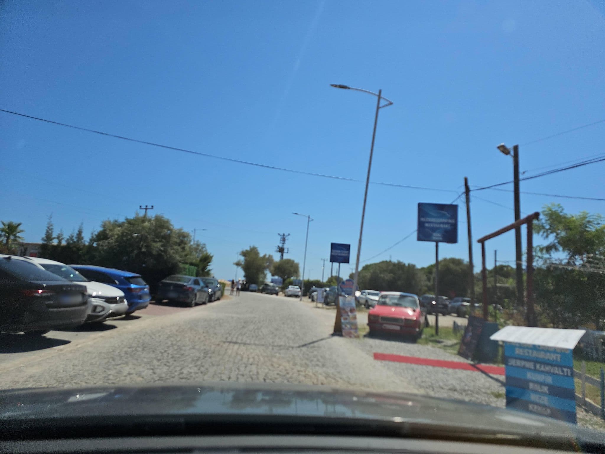 Street view near Assos Troy Otel, Behram — © observer17 (CC BY-SA · Mapillary)