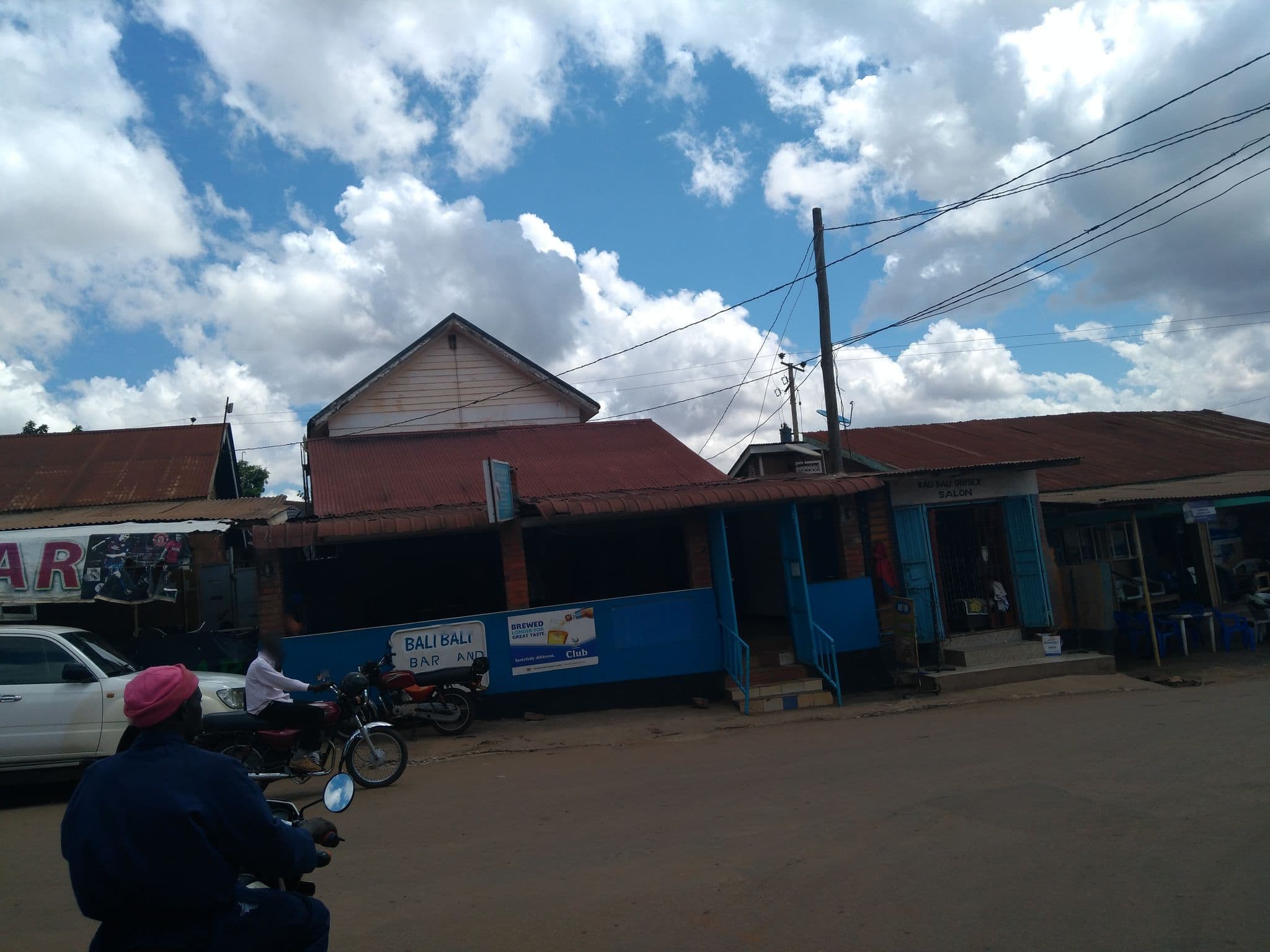 Street view near Premier Guest House, Kampala — © jfrek (CC BY-SA · Mapillary)
