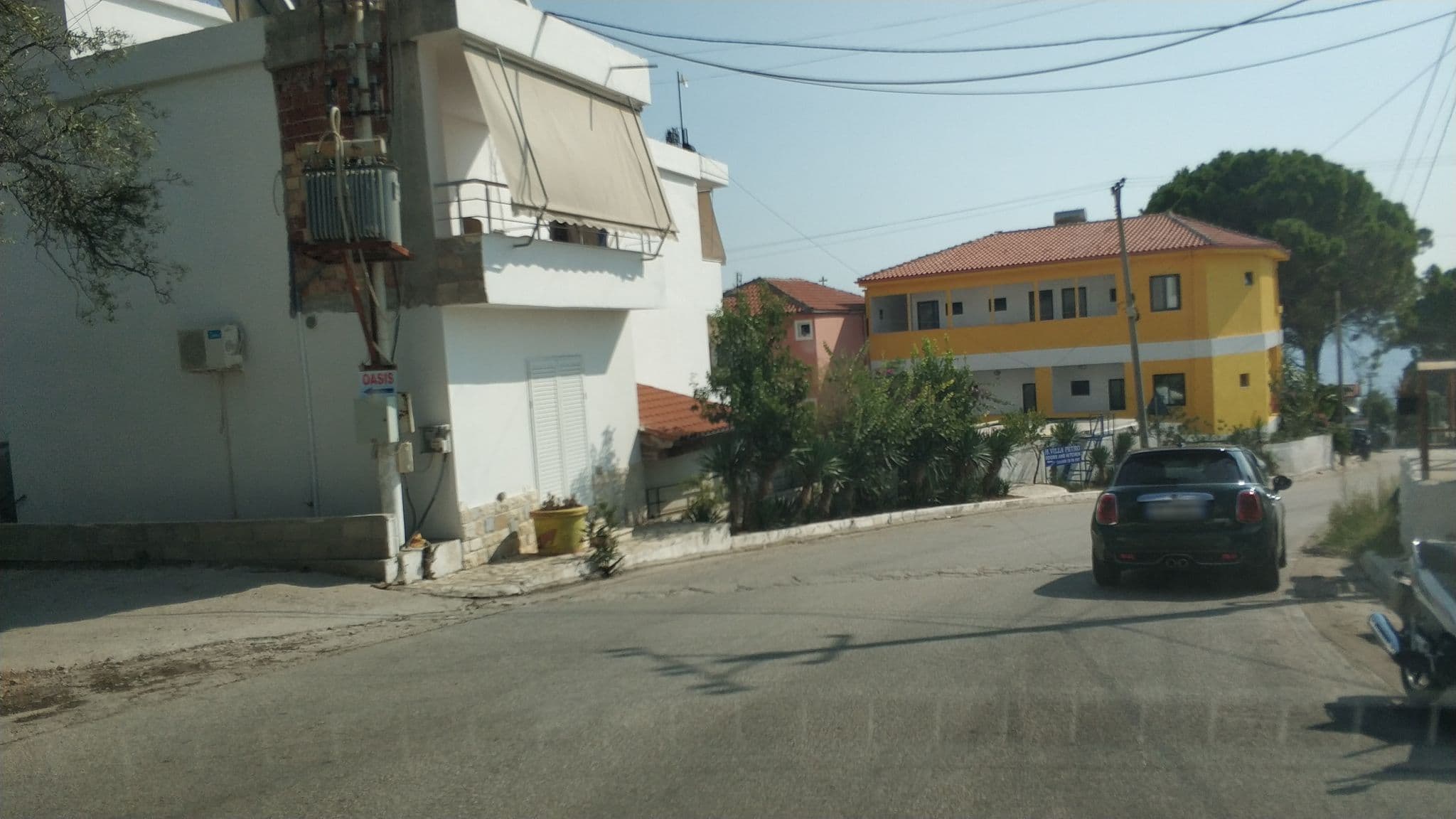 Street view near Serendipity Family Room, Dhërmi — © freddouhelk (CC BY-SA · Mapillary)