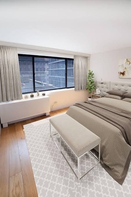Renovated 1 Bedroom Apartment in Luxury Building w/ Rooftop Patio, Doorman & Gym, Hotel in Times Square