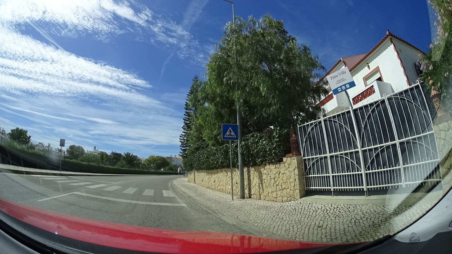 Street view near Palm Villa Estudios, Porto de Mós — © sashazykov (CC BY-SA · Mapillary)