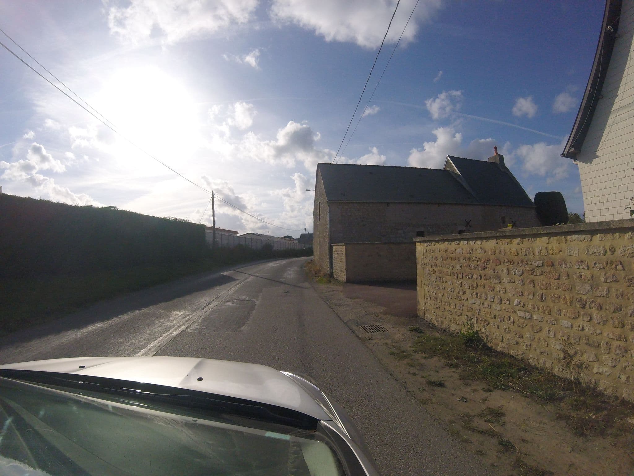 Street view near Camping le Robinson, Port-en-Bessin-Huppain — © javiersanp (CC BY-SA · Mapillary)