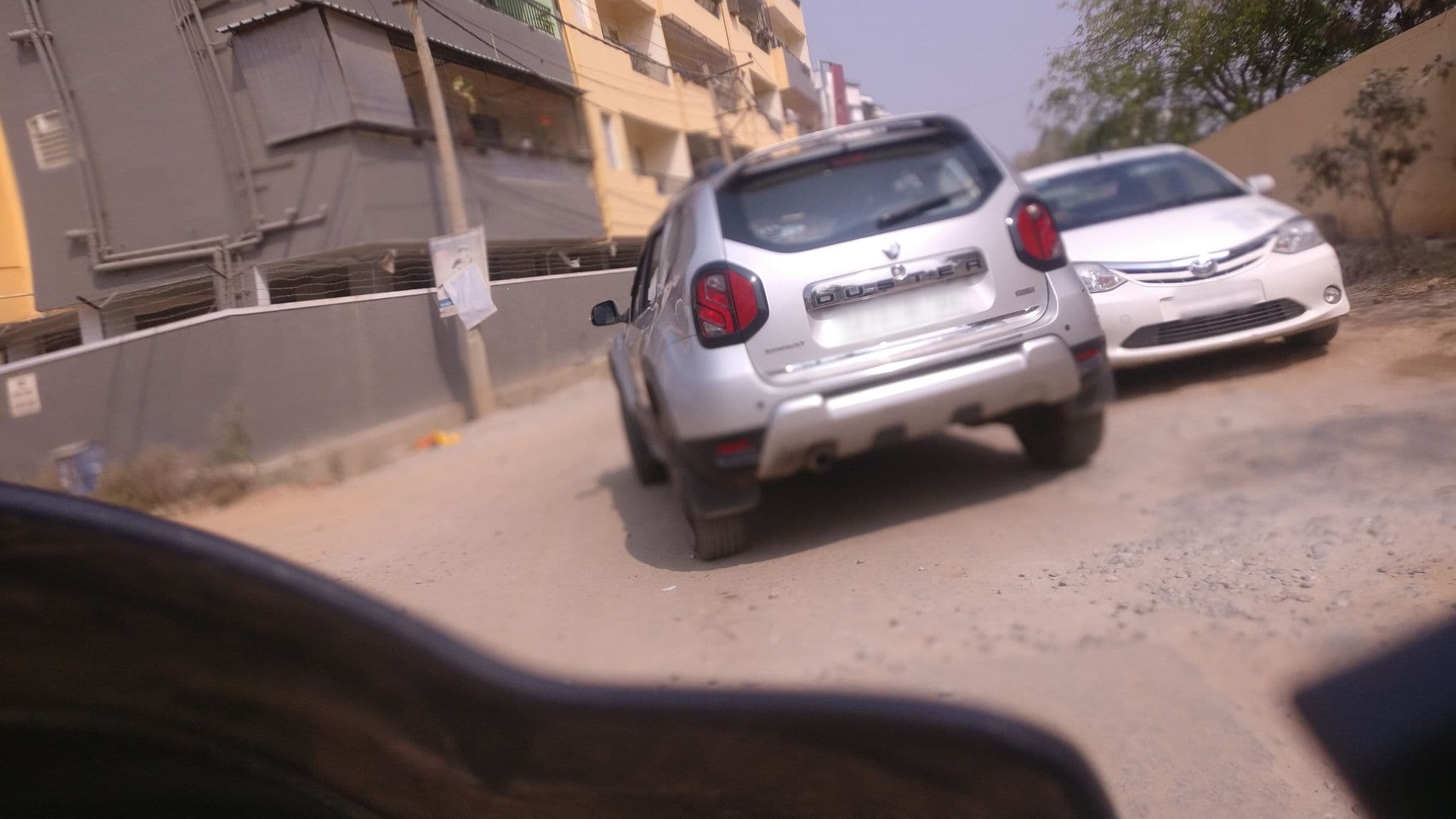 Street view near Udupi Grand, koppana Agrahara — © johnichan (CC BY-SA · Mapillary)