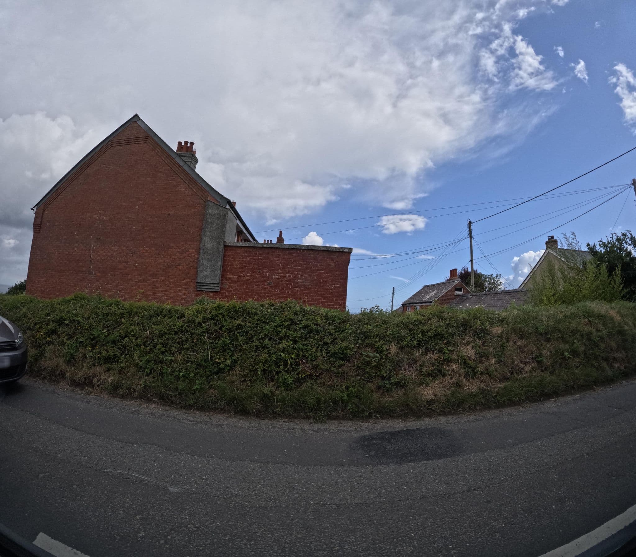 Street view near Tregatherall Lodge, Tintagel — © hobgoblin (CC BY-SA · Mapillary)