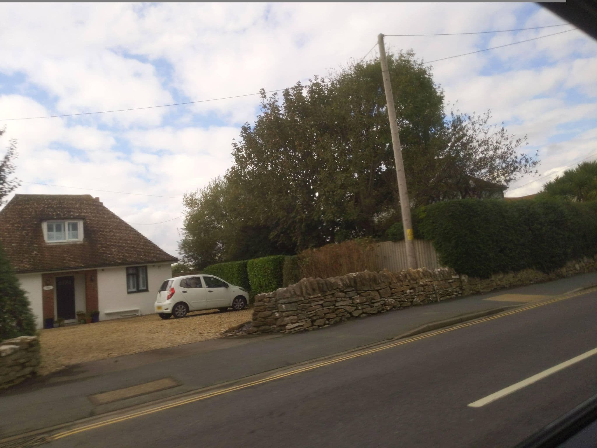 Street view near Seadale, West Bay — © WaggyDog (CC BY-SA · Mapillary)