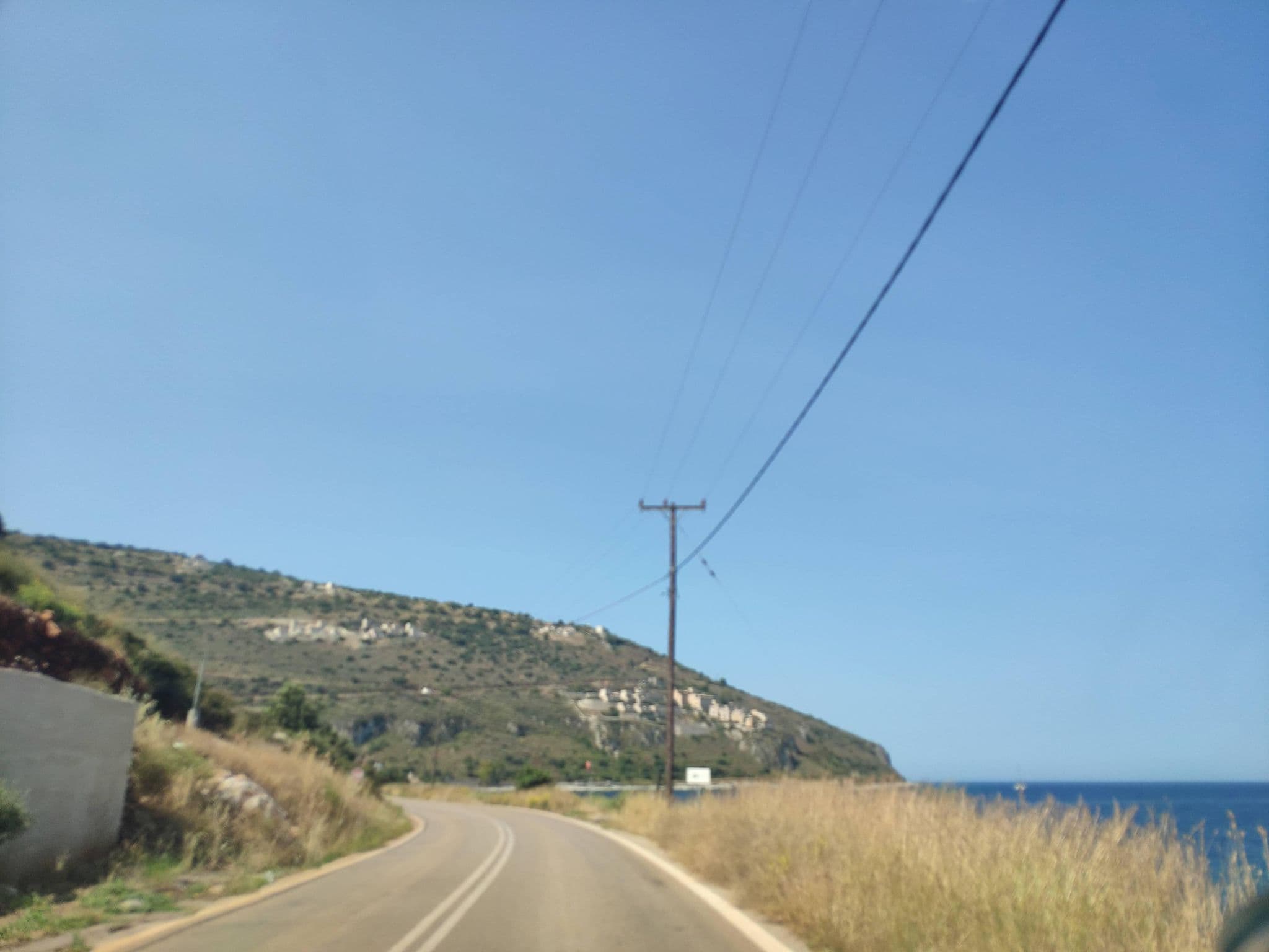 Street view near Yerma Suites, Oítilon — © pppetros (CC BY-SA · Mapillary)