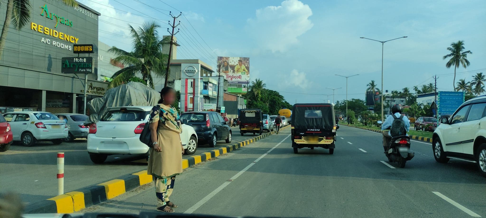 Street view near Aaryas Hotel, Maradu — © V15 (CC BY-SA · Mapillary)